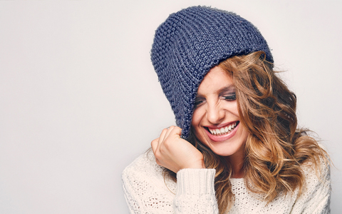 Smiling girl from San Luis Obispo shows off her new dental crown.