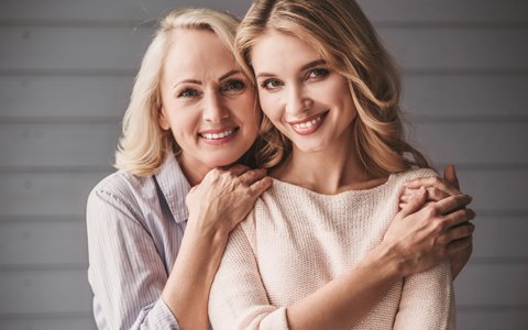 Smiling mother and daughter patients of San Luis Obispo dentist Dr. Deborah McNeil-Amorteguy