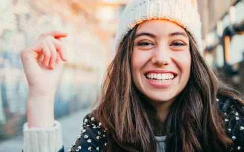 Woman who had a chipped tooth repaired using composite denal bonding in San Luis Obispo.